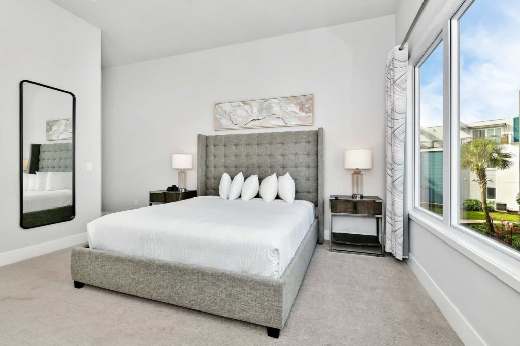 Bedroom 3 with king bed and large windows: 4 Bedroom Condo