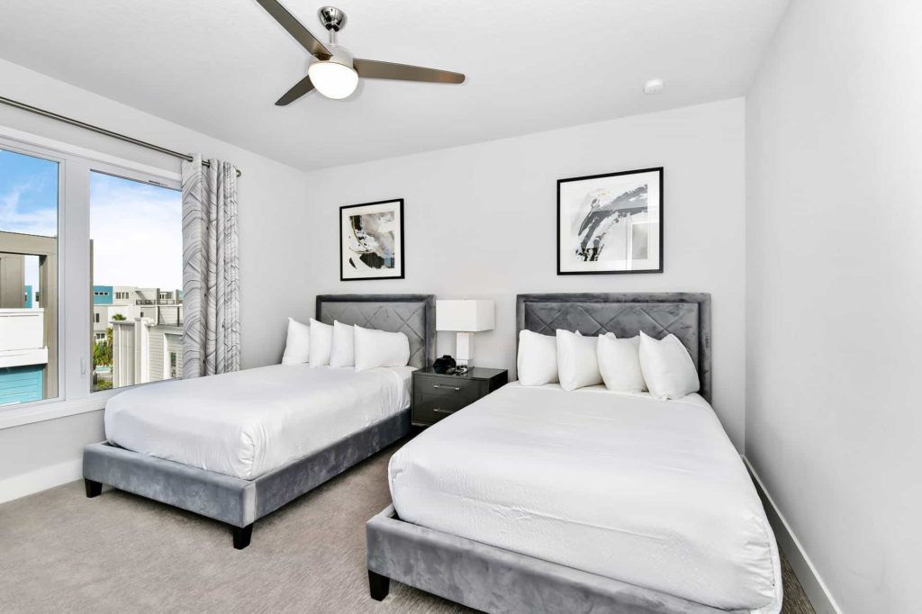 Bedroom 4 with twin single beds and large windows: 4 Bedroom Condo