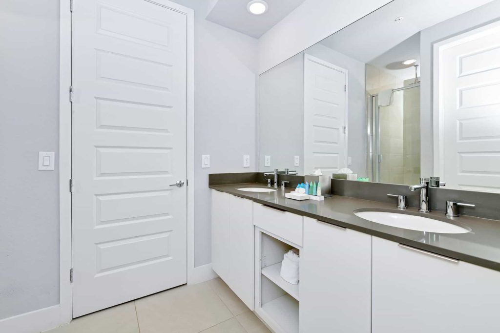Bathroom 4 with double sinks and walk-in shower: 5 Bedroom Condo