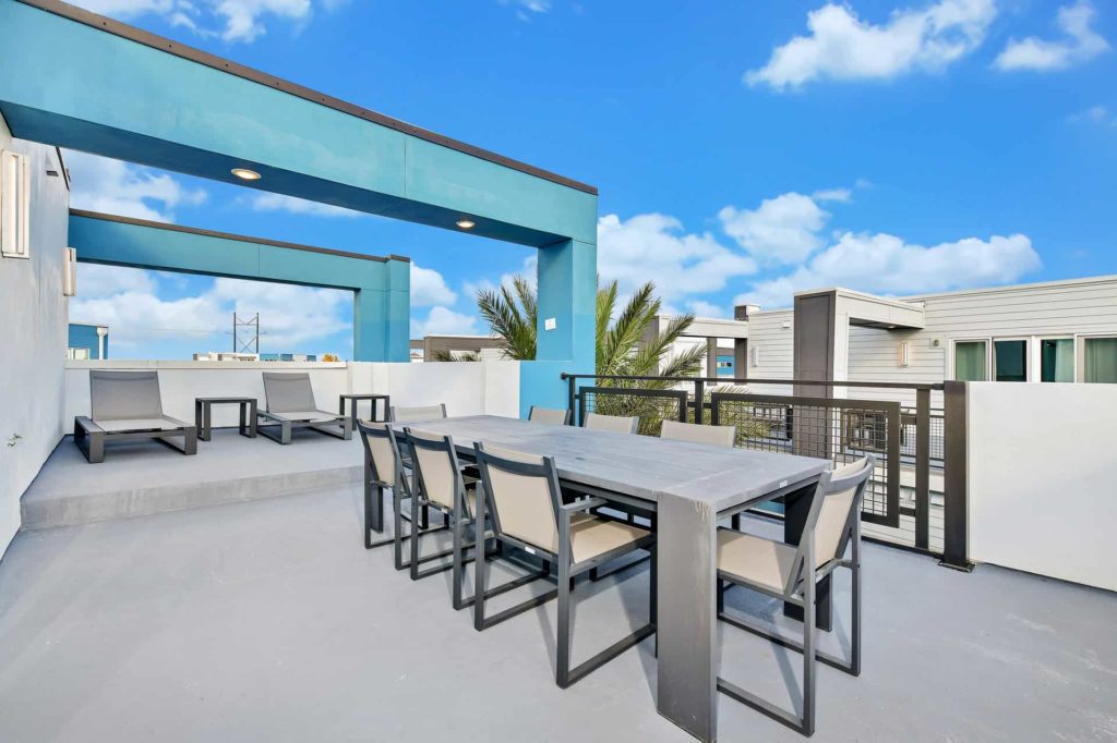 Outdoor terrace with dining table and overhead lighting: 5 Bedroom Condo