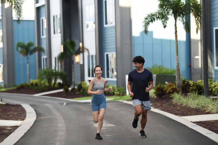 Couple jogging around Spectrum Resort Orlando