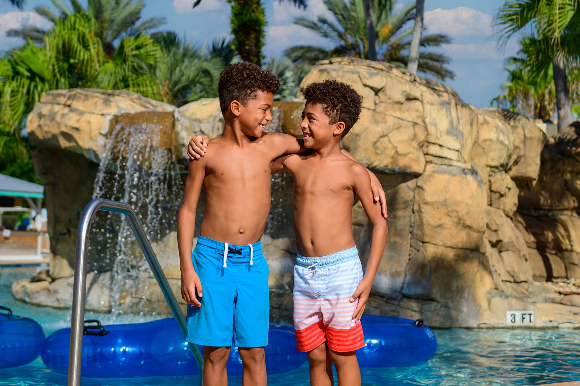 Young brothers having a good time at the Reunion Resort Water Park