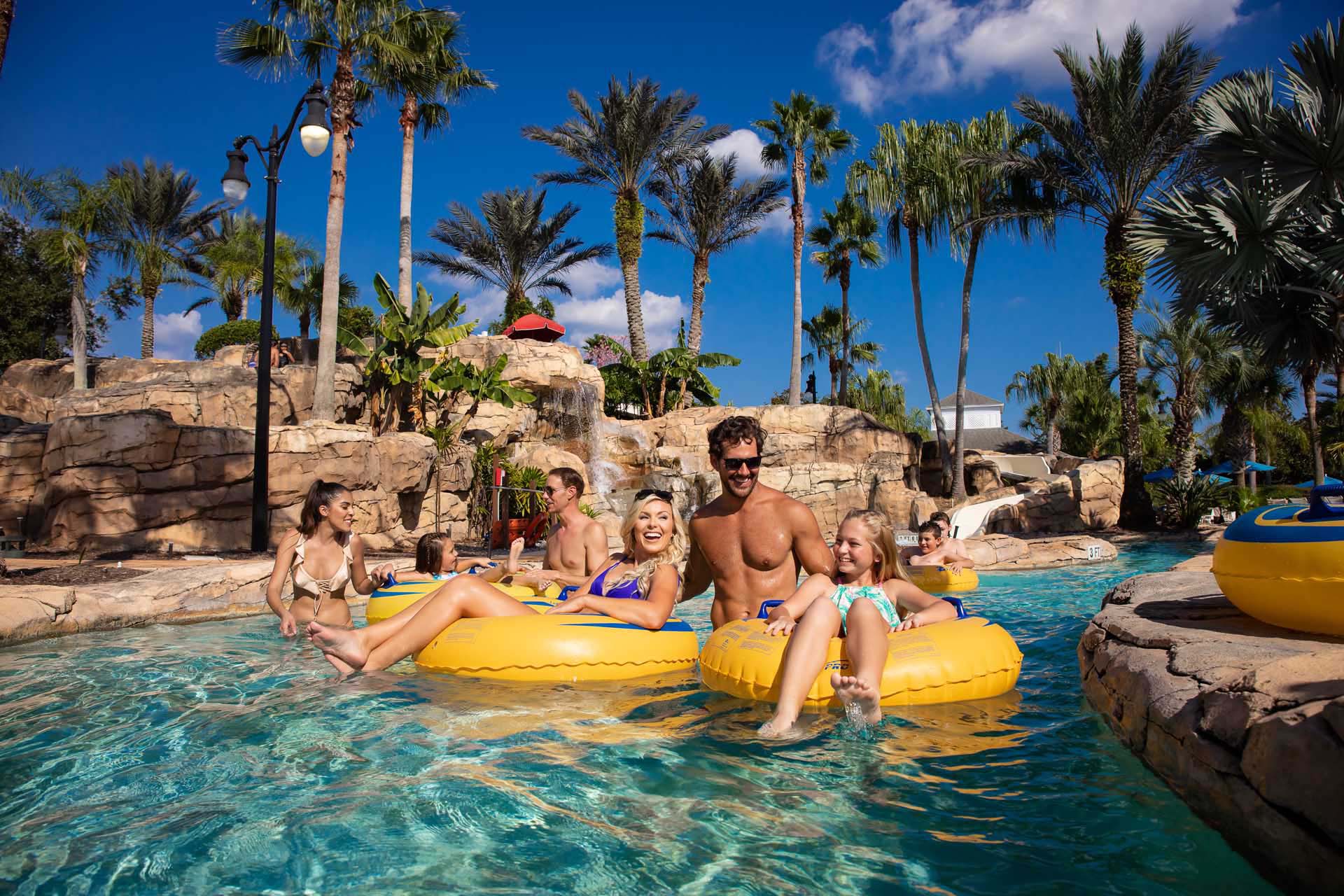 Families enjoying the lazy river at the Reunion Resort Water Park