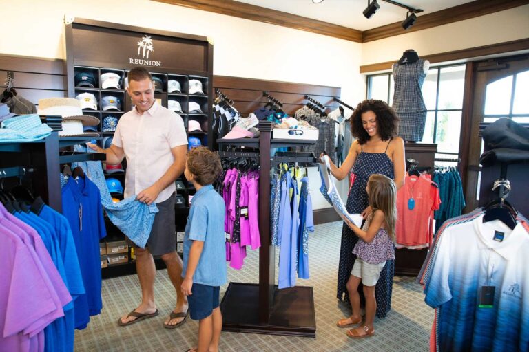 Family shopping in golf store of the Jack Nicklaus Clubhouse at the Bear's Den Resort