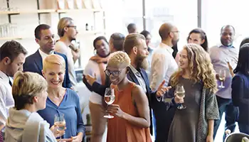 Groups: Large group mingling at a resort event