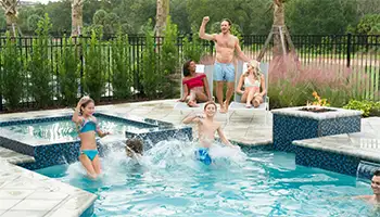Signature Home Offers: Group playing together in a signature home private pool