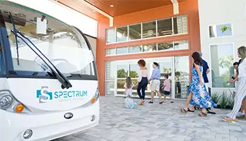 Transportation: A Spectrum Resort Orlando Shuttle Drops Off A Family Reunion Group At The Clubhouse.